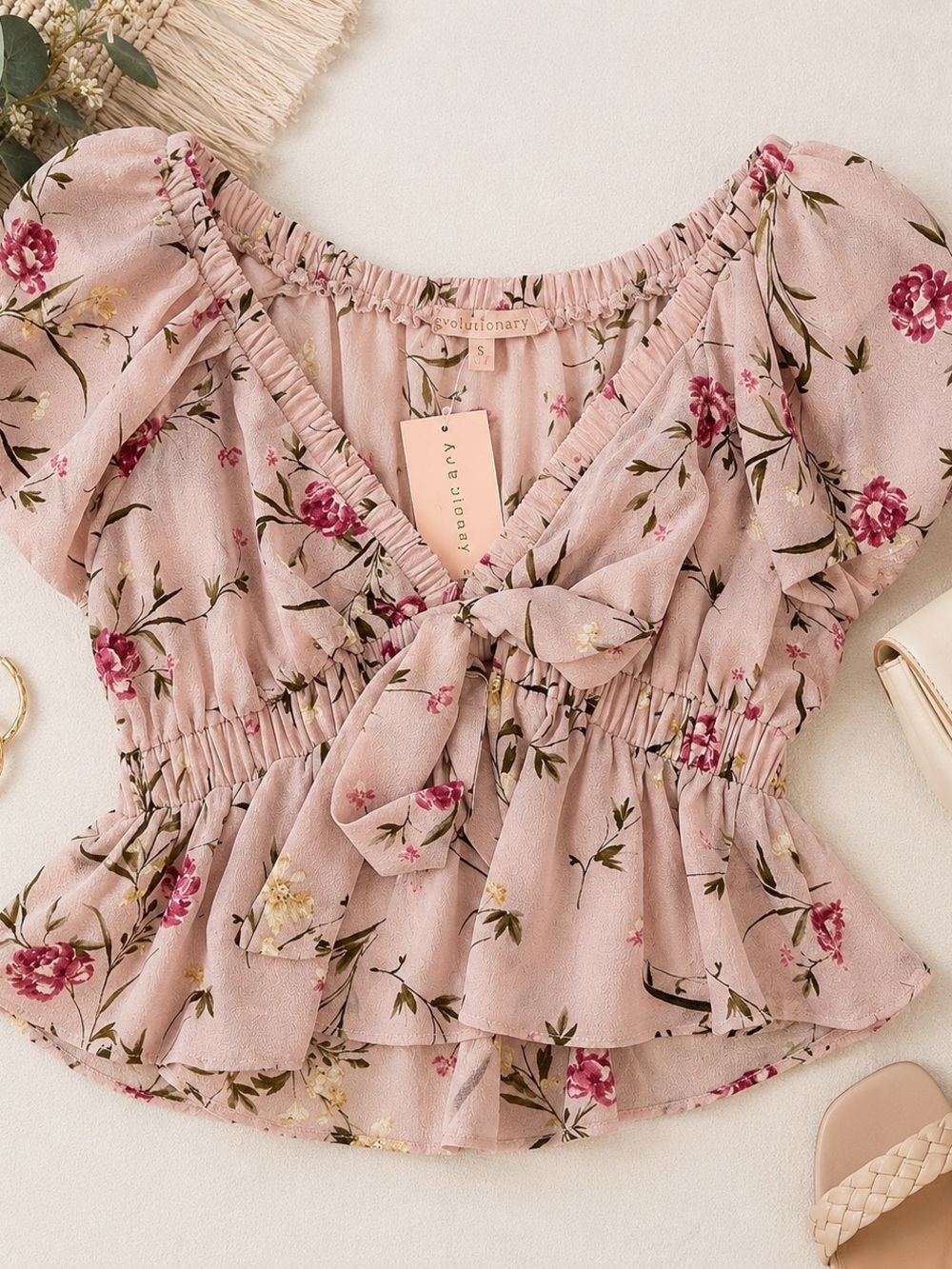 Evolutionary Pink Floral Puff
Sleeve Peplum Blouse NWT